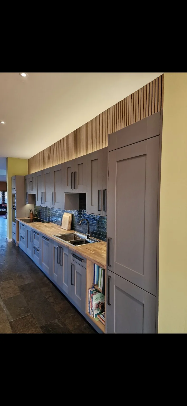 Long painted shaker kitchen with oak worktops in Murthly
