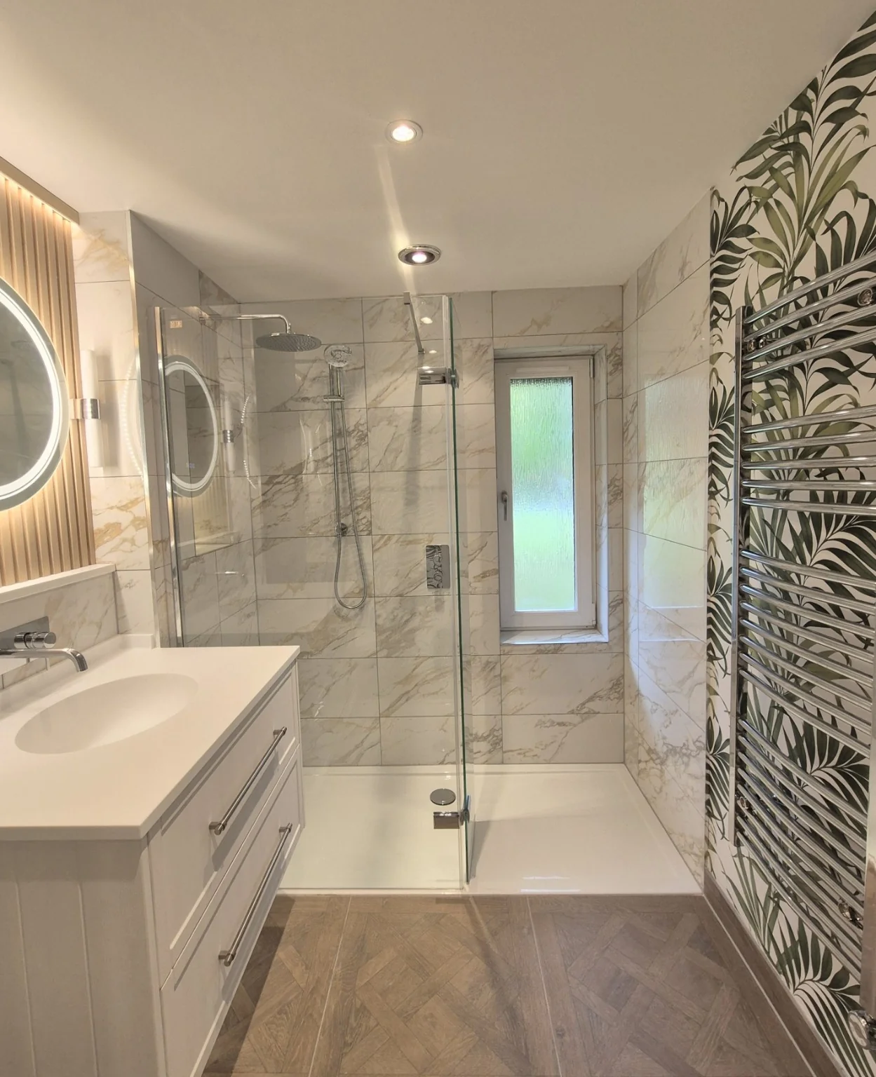 Marble bathroom with a botanical feature wall in Dunkeld